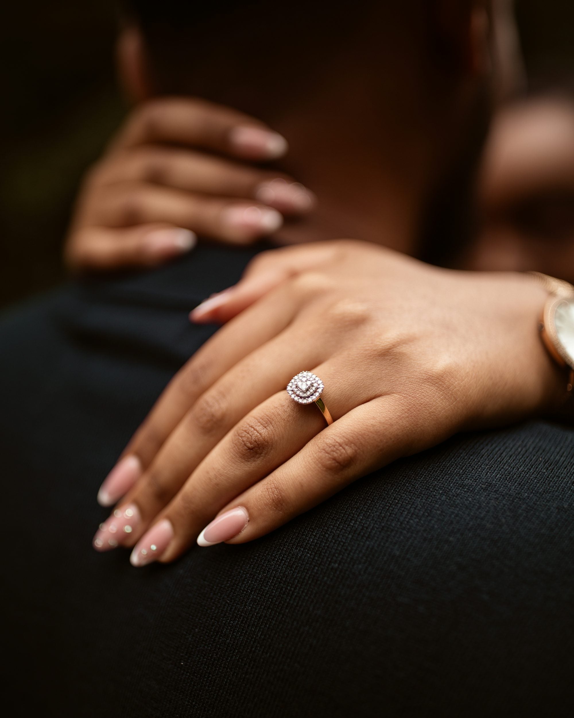The Halo — halo-set lab-grown diamond engagement ring on hand